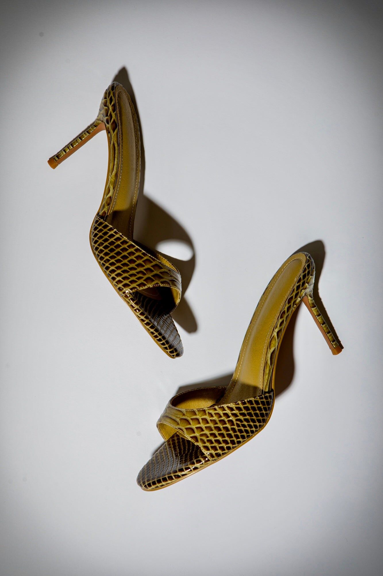 nour olive snake mules 3