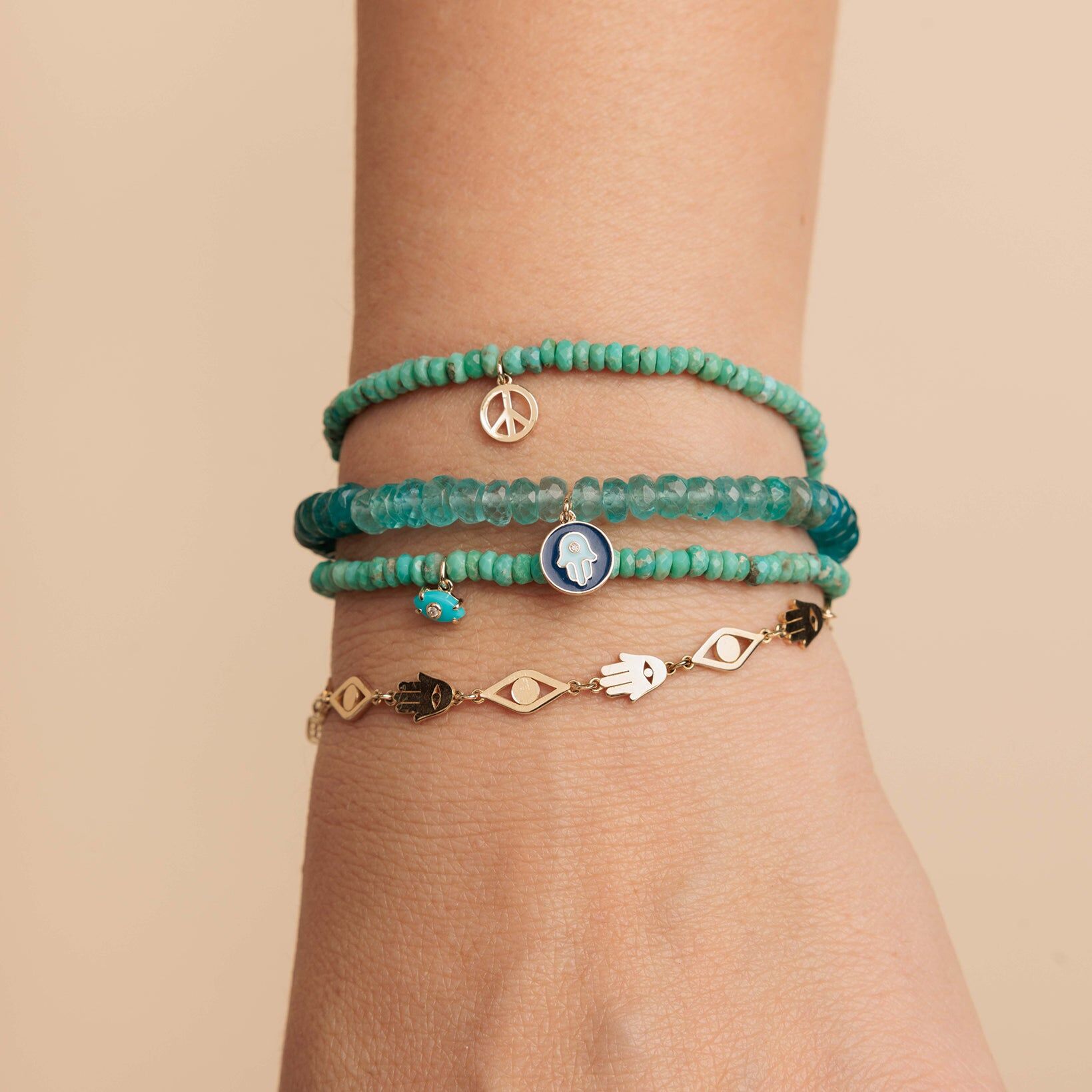 pure gold peace sign on turquoise 2