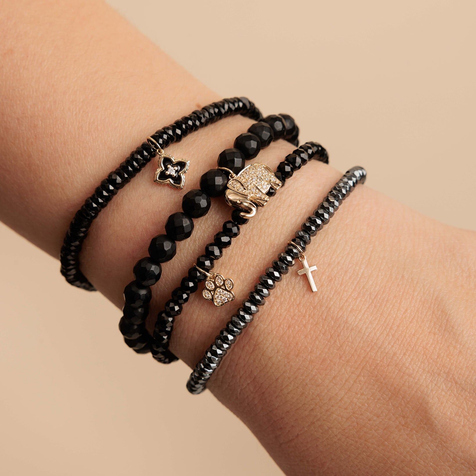 pure gold tiny cross on hematite 2
